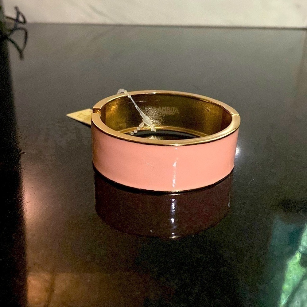 Amrita Singh Peach enamel hinged closure bangle bracelet. 3” by 1” .NWT.
